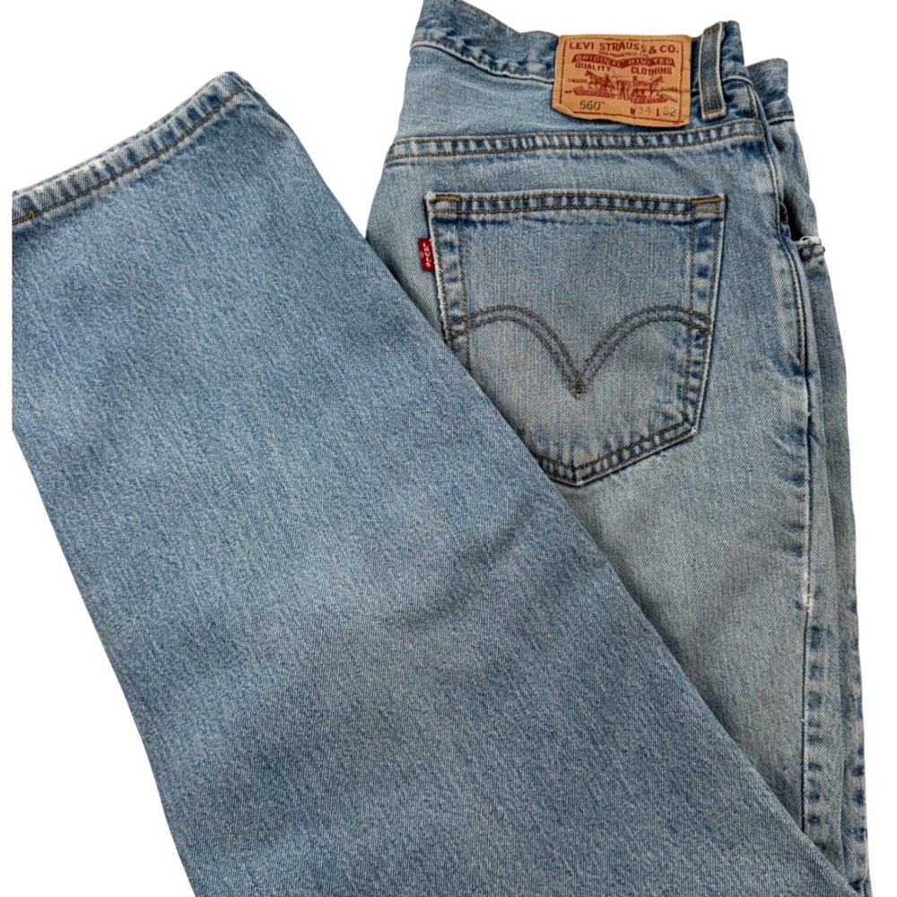 Vintage Levis 560 Loose Fit Tapered Leg Jeans Light Wash Mens 34x32 90s Denim